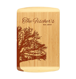 Unique bamboo cutting board design shows family tree outline and personalized with family name and established date.  Laser engraved for detailed look.