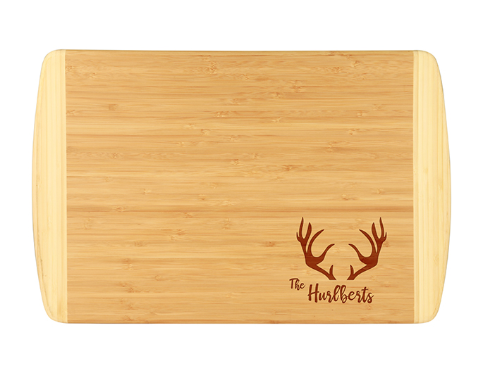 Custom antler bamboo cutting board with custom last name.  Laser engraved bamboo cutting board is perfect for a gift or house warming present.