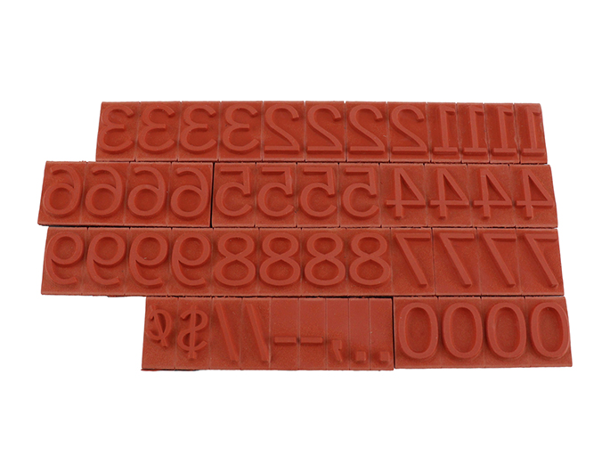 RIBtype FA14  number set.  This set of RIBtype characters comes with 49 total pieces.  3 ribs on the back of numbers and special characters.  Characters are 5/16" tall which is equivalent to 30pt font size.