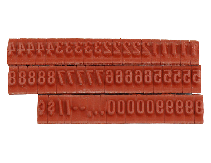 RIBtype FU70 bold number set.  This set of RIBtype characters comes with 59 total pieces.  2 ribs on the back of numbers and special characters.  Characters are 1/8" tall which is equivalent to 14pt font size.