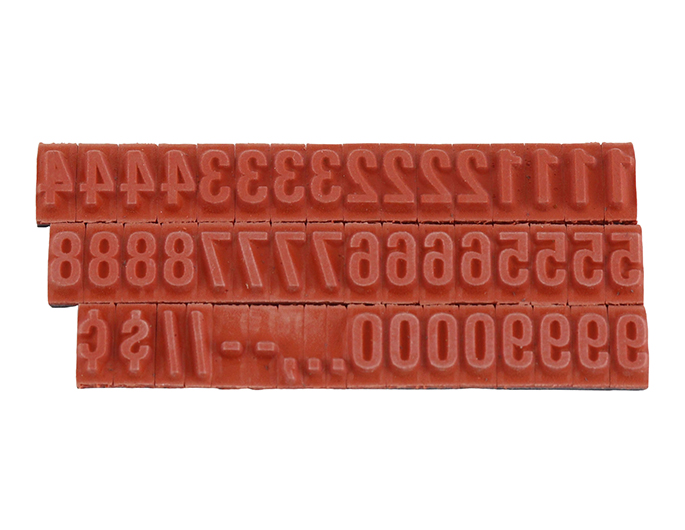 RIBtype FU73 bold number set.  This set of RIBtype characters comes with 49 total pieces.  2 ribs on the back of numbers and special characters.  Characters are 1/4" tall which is equivalent to 24pt font size.