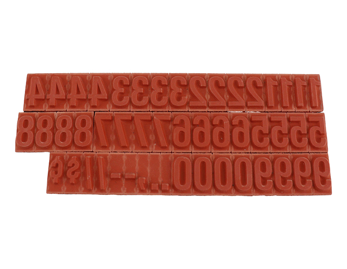 RIBtype FU76 bold number set.  This set of RIBtype characters comes with 59 total pieces.  4 ribs on the back of numbers and special characters.  Characters are 1/2" tall which is equivalent to 14pt font size.