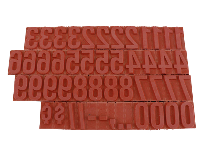 RIBtype FU77 bold number set.  This set of RIBtype characters comes with 49 total pieces.  4 ribs on the back of numbers and special characters.  Characters are 5/8" tall which is equivalent to 64pt font size.