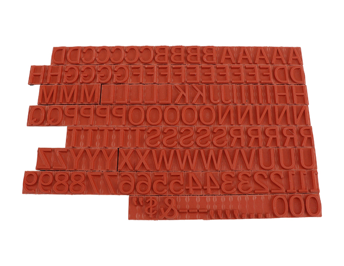 TA15 RIBtype letter / number set.  This set of RIBtype characters comes with 136 total pieces.  3 ribs on the back of characters and numbers.  Characters are 3/8" tall which is equivalent to 36pt font size.