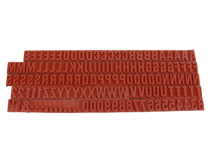 TU73 RIBtype bold letter / number set.  This set of RIBtype characters comes with 136 total pieces.  2 ribs on the back of characters and numbers.  Characters are 1/4" tall which is equivalent to 24pt font size.